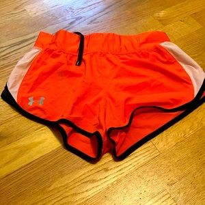 Under armour shorts. Pink/white/black. Size small.